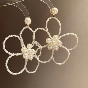 French vintage pearl beaded flower dangle earrings with elegant hollow design for women