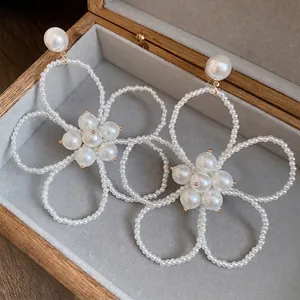 French vintage pearl beaded flower hollow drop earrings presented in a luxury box