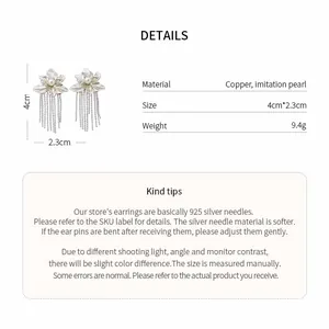 Detail view of flower tassel earrings showing measurements 4cm by 2.3cm and material info.