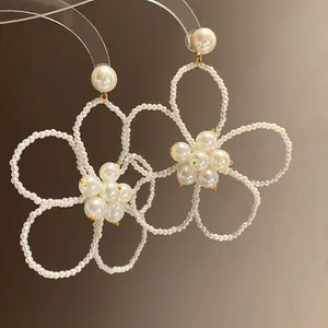 Elegant French retro white pearl beaded flower hollow drop earrings fashion jewelry