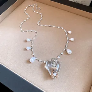 Vintage pearl necklace with cute flocked teddy bear pendant in heart charm