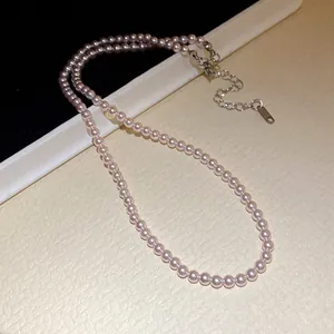 Elegante Halskette mit rosa Perlen und verstellbarer silberner Verlängerungskette für Damen