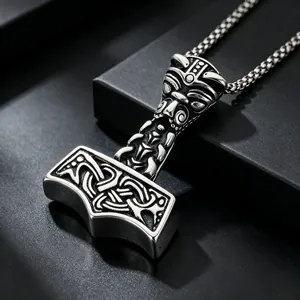Detailed view of a vintage Viking Mjölnir Thor's Hammer pendant made of stainless steel