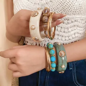 Elegant vintage resin bangles with shell and pearl accents, retro style jewelry for women