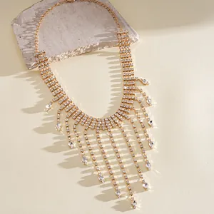 Detailed macro view of sparkling rhinestone fringe necklace with teardrop charms