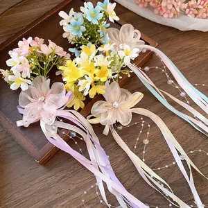 Romantic colorful floral hair clips with long flowing ribbons and pearls
