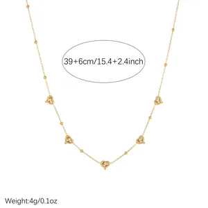 Detailed view of a gold-plated heart necklace with size and weight measurements.