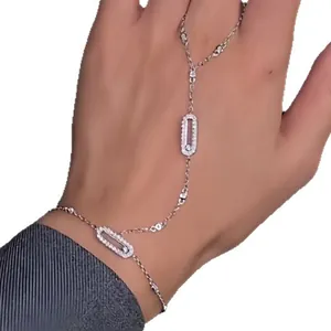 Elegante bracciale a mano in argento con ovali geometrici cavi in zirconia cubica da donna