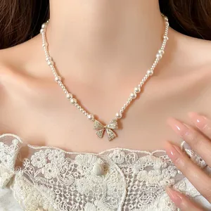 French Vintage Bow-knot Artificial Pearl Necklace Luxury Zirconia Inlaid Copper Pendant Choker For Women Elegant Fashion Jewelry