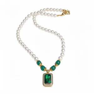 Elegant vintage pearl necklace with emerald green square pendant and zircon accents