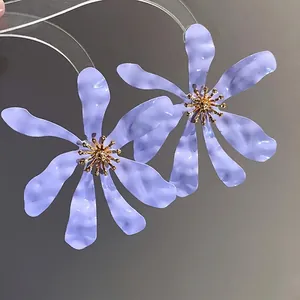 Elegant oversized lavender flower petal earrings with golden center for summer vacation style