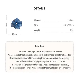 Detailed view of blue chiffon gingham scrunchie showing its 16cm size and product specs.