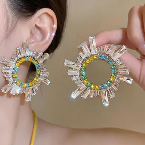 Orecchini vintage francesi a stella con cristalli, perni in argento e strass