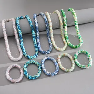Detailed view of colorful crystal beaded necklace and bracelet sets with magnetic clasps.