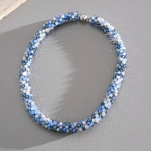 Close-up view of blue and white faceted crystal beaded choker necklace with magnetic clasp