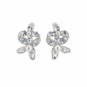 Elegant silver-toned flower stud earrings with marquise crystals and white pearls
