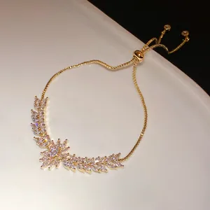 Detailed view of luxury zircon bracelet featuring intricate wheat ear and floral motif.