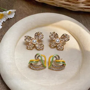 Elegant silver needle flower and heart stud earrings with faux pearls and zircons for women