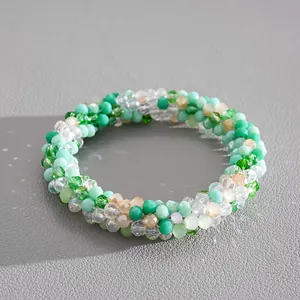 Close-up detail of fresh multi-colored faceted crystal beads on a magnetic jewelry piece.