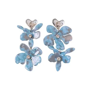 Sweet blue marbled flower earrings with heart studs and clear rhinestone accents
