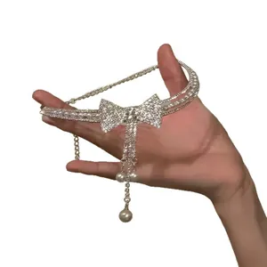 Elegant rhinestone bow choker necklace with pearl tassels, perfect for formal evening dresses