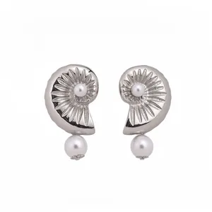 Elegant silver-toned nautilus shell stud earrings with lustrous white pearls