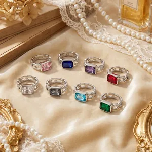 Collection of retro square zircon rings in multiple colors on velvet cloth