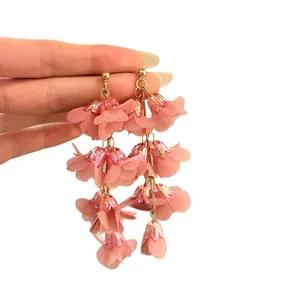 Elegant pink lily of the valley flower tassel earrings for stylish seaside vacation look