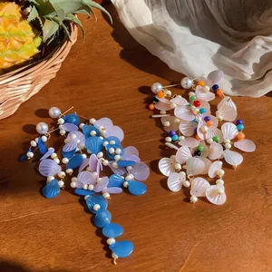 Fairy-style vacation earrings with sequin fringe and pearls on silver needles