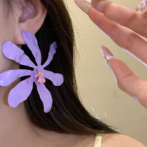 Oversized purple flower drop earrings with wrinkled petal design and pink center detail