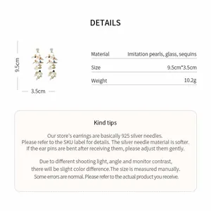 Detailed view of sequin tassel pearl earrings with size and material specifications.