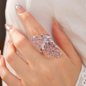Close-up detail of the pink zircon butterfly wing ring showing intricate craftsmanship