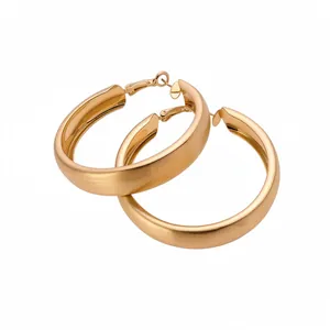 Elegant minimalist gold brushed chunky hoop earrings with high-end matte textured finish