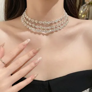 Elegant three-layer rhinestone choker necklace for women with sparkling round crystals.