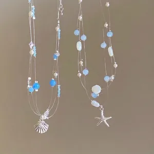 Blue ocean theme layered necklace with starfish shell and pearls for vacation