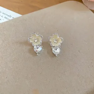 Fresh S925 silver needle flower earrings with heart-shaped rhinestone drops for women