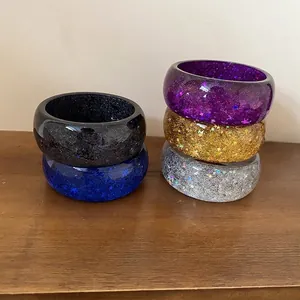 Chunky colorful resin bangles set with star sequins and glitter details
