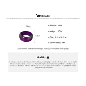Detail of purple resin bangle with sequins showing size 8.2cm and material info