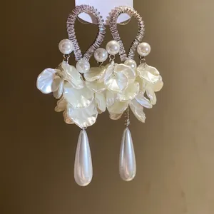 Elegant zircon and pearl flower petal drop earrings with a large teardrop pearl design