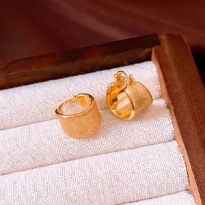 Elegant 18k gold plated brushed hoop earrings with a minimalist and luxury fashion design