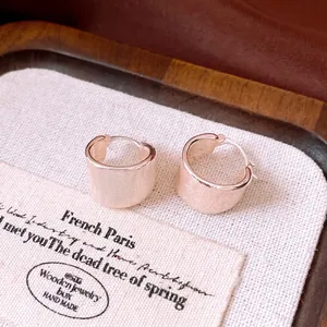Minimalist 18k gold plated brushed round hoop earrings with a textured luxury finish