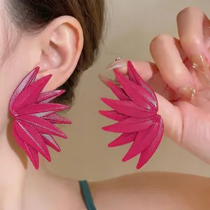 Elegant oversized fuchsia leaf pattern layered design stud earrings for women's fashion.