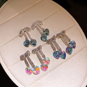 Iridescent zirconia bow earrings with heart-shaped crystal drops for women
