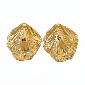 Elegant gold textured leaf stud earrings with minimalist metal design for women