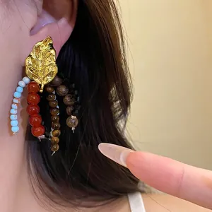 Vintage ethnic style leaf earrings with colorful wooden beads and stone tassels jewelry