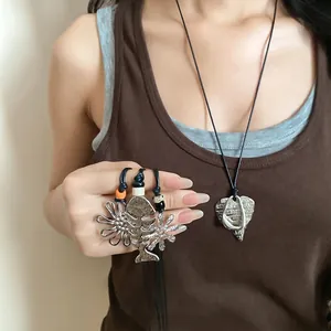 Trendy silver flower and fish bone beaded necklace for women with niche fashion design