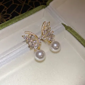 Elegant 18k gold plated butterfly pearl earrings with sparkling zircon crystals