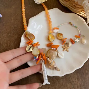 Strand-Stil Perlenkette und Armband-Set mit filigranen Muschel- und Seesternanhängern