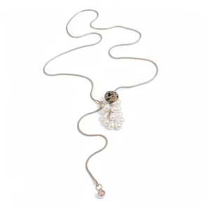Elegant silver snake chain lariat necklace with teardrop pearls and spotted stone
