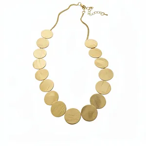 Elegant gold collar necklace featuring brushed metal circular pendants on a delicate chain link